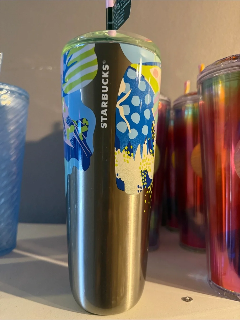 Starbucks Silver Tumbler with Blue & Yellow Abstract Accents